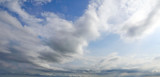 Fototapeta Niebo - clouds over an island, north sea, langeoog
