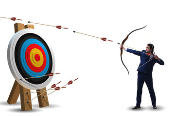 Businessman aiming arrow with bow