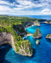 Aerial View At Sea And Rocks. Turquoise Water Background From Top View. Summer Seascape From Air. Atuh Beach, Nusa Penida, Bali, Indonesia. Travel - Image