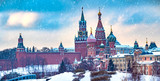 Fototapeta Londyn - Moscow. Capital of Russia. Panorama of Moscow. Winter in Russia. The Moscow Kremlin. Russian Federation in winter. Panorama of the Kremlin. Spasskaya Tower. St Basil's Church. Architecture of Russia.