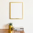 © mallmo - Golden frame mockup and desk with succulent plant and fashion magazines.