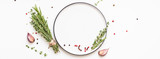 Fototapeta Konie - Empty plate with greens herbs and spices around