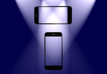 horizontal and vertical smartphone copy space illuminated by spotlight in blue shade