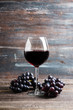 © maxandrew - Red wine in glass on the rustic background. Selective focus. Shallow depth of field.