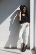 © Bangkok Click Studio - Asian woman clasp one's hands near window..