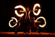 Luau Hawaii, French Polynesia Fire Dance Silhouettes Of Professional Dancers At Night On Beach Resort Tiki Party.