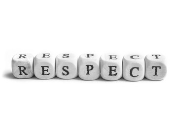 concept word forming on wooden cube on white background - respect