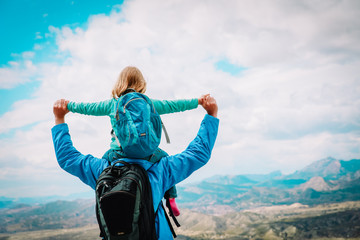 happy father with little daughter travel in nature