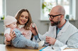 © Nejron Photo - Mother with baby visiting pediatrician