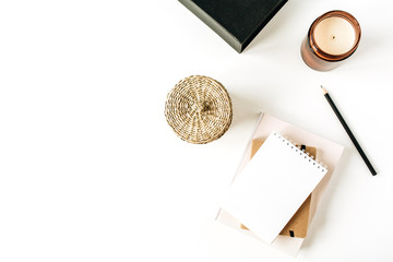Wall Mural - Neutral minimal office desk workspace with notebook on white background. Flat lay, top view.