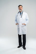 © opolja - Full body portrait of happy smiling doctor, isolated on white background.