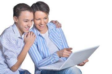 Canvas Print - Fine family with laptop on white background