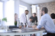 © Africa Studio - Office employees having meeting in conference room. Finance trading