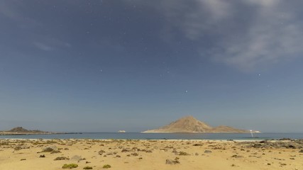 Wall Mural - timelapse milky way star trails nightscape at atacama desert coastal area. white sands at 