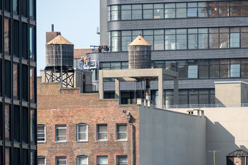 typical water tank on the roof of a building in new york city