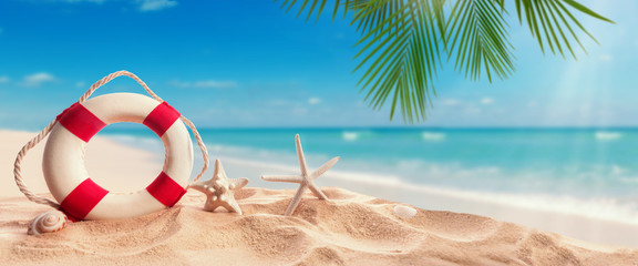 Safety buoy with starfish on the tropical beach