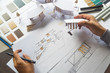 © Chaosamran_Studio - architect design working drawing sketch plans blueprints and making architectural construction model in architect studio