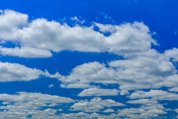 White fluffy clouds in a blue sky