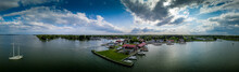 Aerial Panorama Of Shipyard And Lighthouse In St. Michaels Harbor In Maryland In The Chesapeake Bay