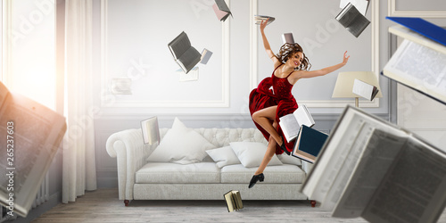 Young and beautiful female dancer in a red dress. Mixed media