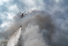 Rescue Helicopter Drops Water Extinguishes The Fire