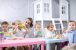 © Oksana Kuzmina - Babies eating healthy lunch in nursery or daycare centre