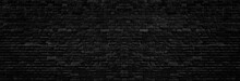 Wide Old Black Shabby Brick Wall Texture. Dark Masonry Panorama. Brickwork Panoramic Grunge Background