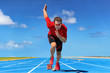© Maridav - Runner athlete starting running at start of run track on blue running tracks at outdoor athletics and fiel stadium. Sprinter on race. Sport and fitness man sprinting.