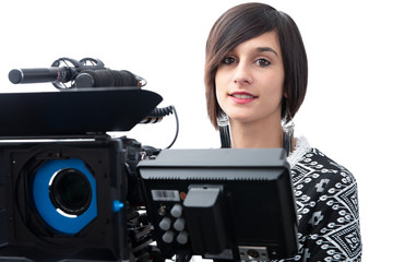 Wall Mural - young woman with professional video camera, dslr, on white