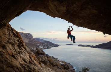 Wall Mural - Rock climber hanging on rope after falling of cliff