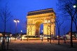 Arc de Triomphe and Champs-Elysees at night during winter in Paris, France