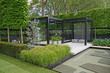 A cool modern garden with some Scandinavian style and a water feature