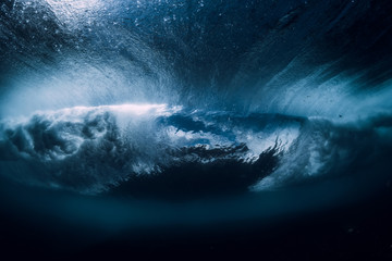 Wall Mural - Barrel wave underwater with air bubbles. Ocean in underwater