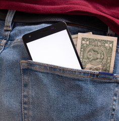 Wall Mural - Money and phone stick from the back pocket of jeans