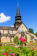 Wall Mural - Red roses at Varnhems church in Sweden