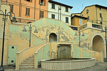 Wall Mural - Forli, Castrocaro, medieval village fountain in Martelli square.