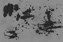 Black With Gray Paint Splatter Effect Texture On Gray Paper Background. Artistic Backdrop. Different Paint Drops.