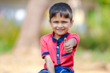 Canvas Print - Indian Child Playing in outdoor