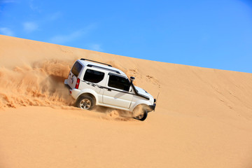 Off-road vehicle traveling in the desert