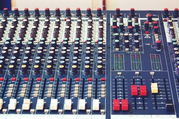 sound and audio mixer control panel with buttons and sliders