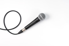Microphone On White Background With Clipping Path . Close Up Of Dynamic Microphone Connect With Male Xlr Connector And  Cable Isolated On White Background,top View.
