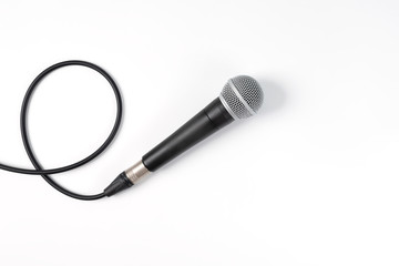 microphone on white background with clipping path . close up of dynamic microphone connect with male