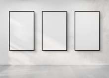 Three Frames Hanging On A Wall Mockup 3d Rendering