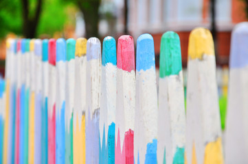 raznotsvenny fence on the playground