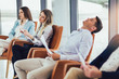 © Mediteraneo - Photo of candidates waiting for a job interview.