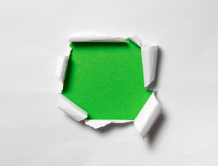 Sticker - Hole in the paper with space for text on green background