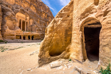 Fototapete - Sandstone caves in Little Petra, ancient city of Petra, Jordan