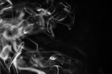 White smoke on a black background. Abstract elegant monochrome background.