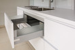 © Mint Images - Open drawer in modern kitchen