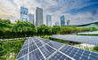 solar panels with cityscape of modern city,Ecological energy renewable concept.